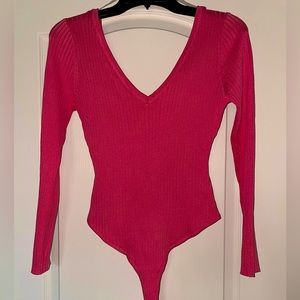 Pink ribbed long sleeve body suit